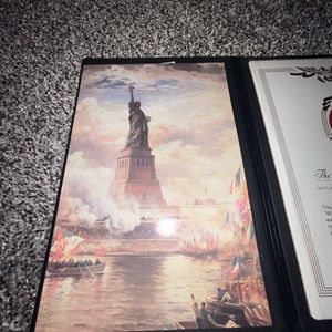 A liberty collectors coin and booklet about the coin